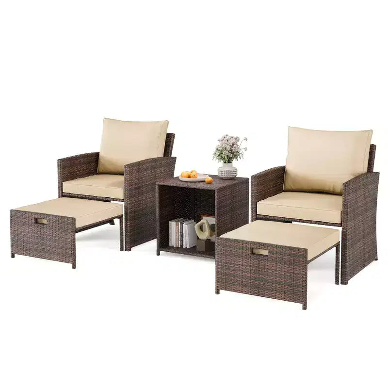 5-piece rattan outdoor patio furniture set includes plush cushions, two ottomans, and a double-decker coffee table.