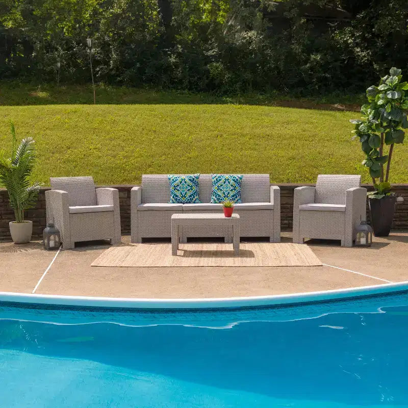 Flash Furniture Ensemble quatre pièces de fauteuils, canapé et table de jardin en similicuir tressé
